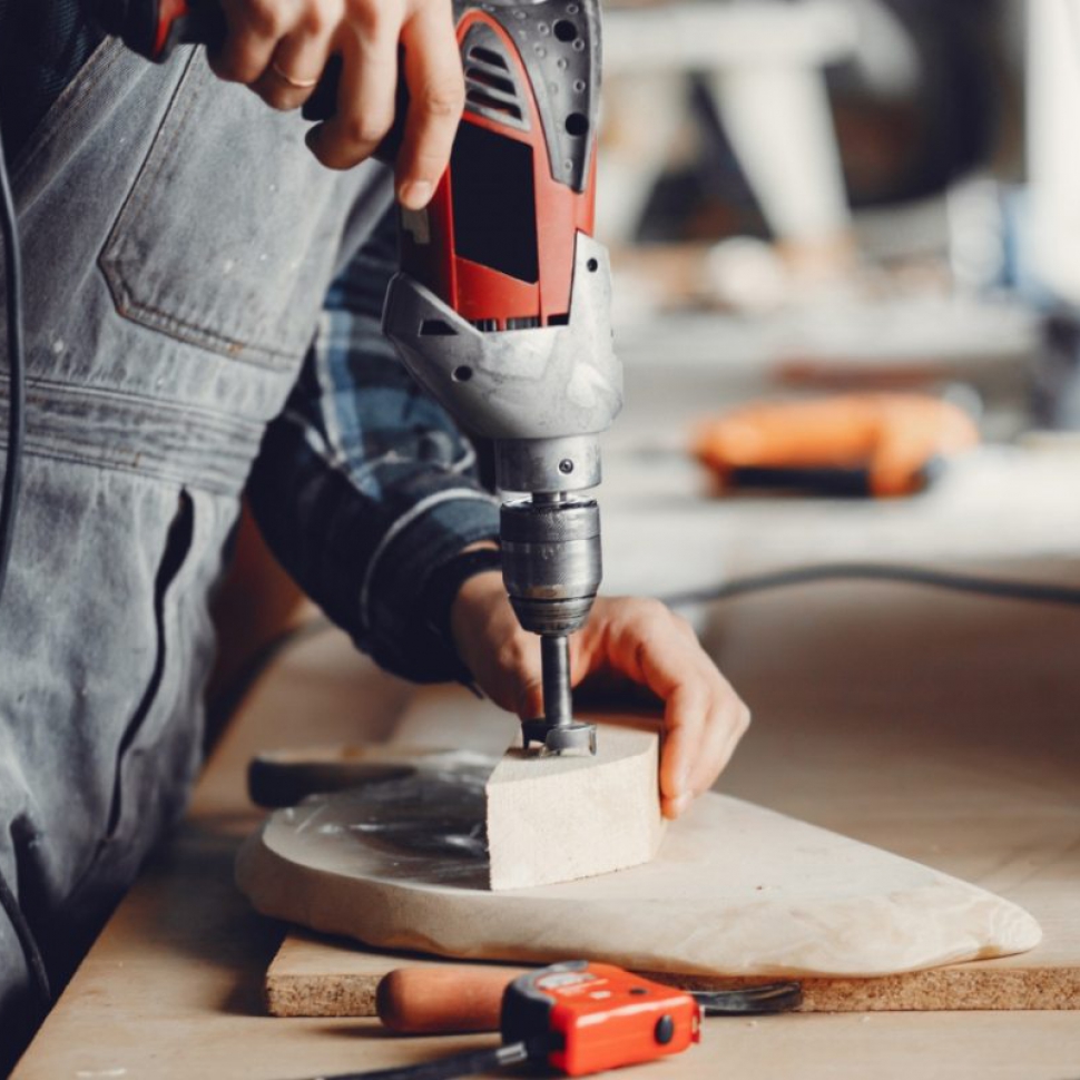 carpenter-works-with-tree1-min